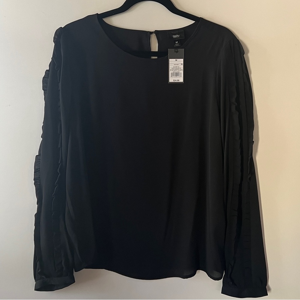 NWT Massimo size medium made in China
Black, long sleeve blouse